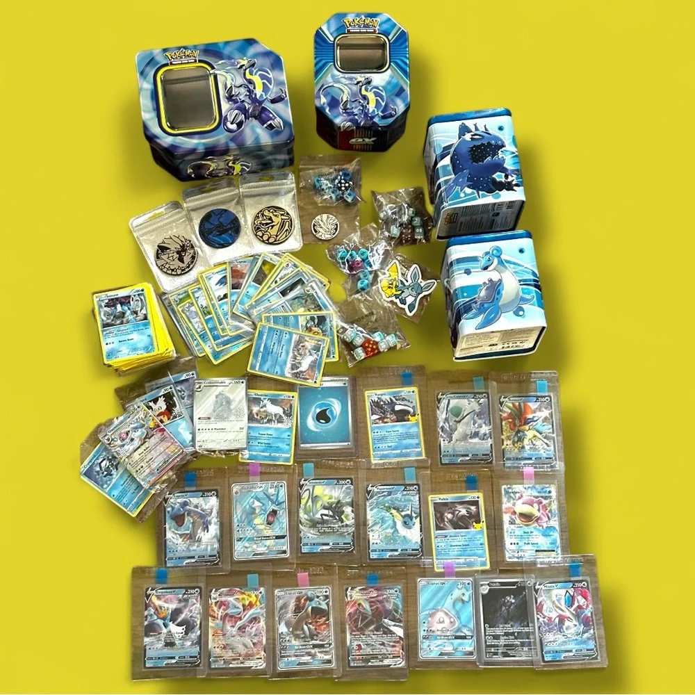 Pokemon Card Collection with Tins and Accessories 25 card Mystery Tin plus bonus